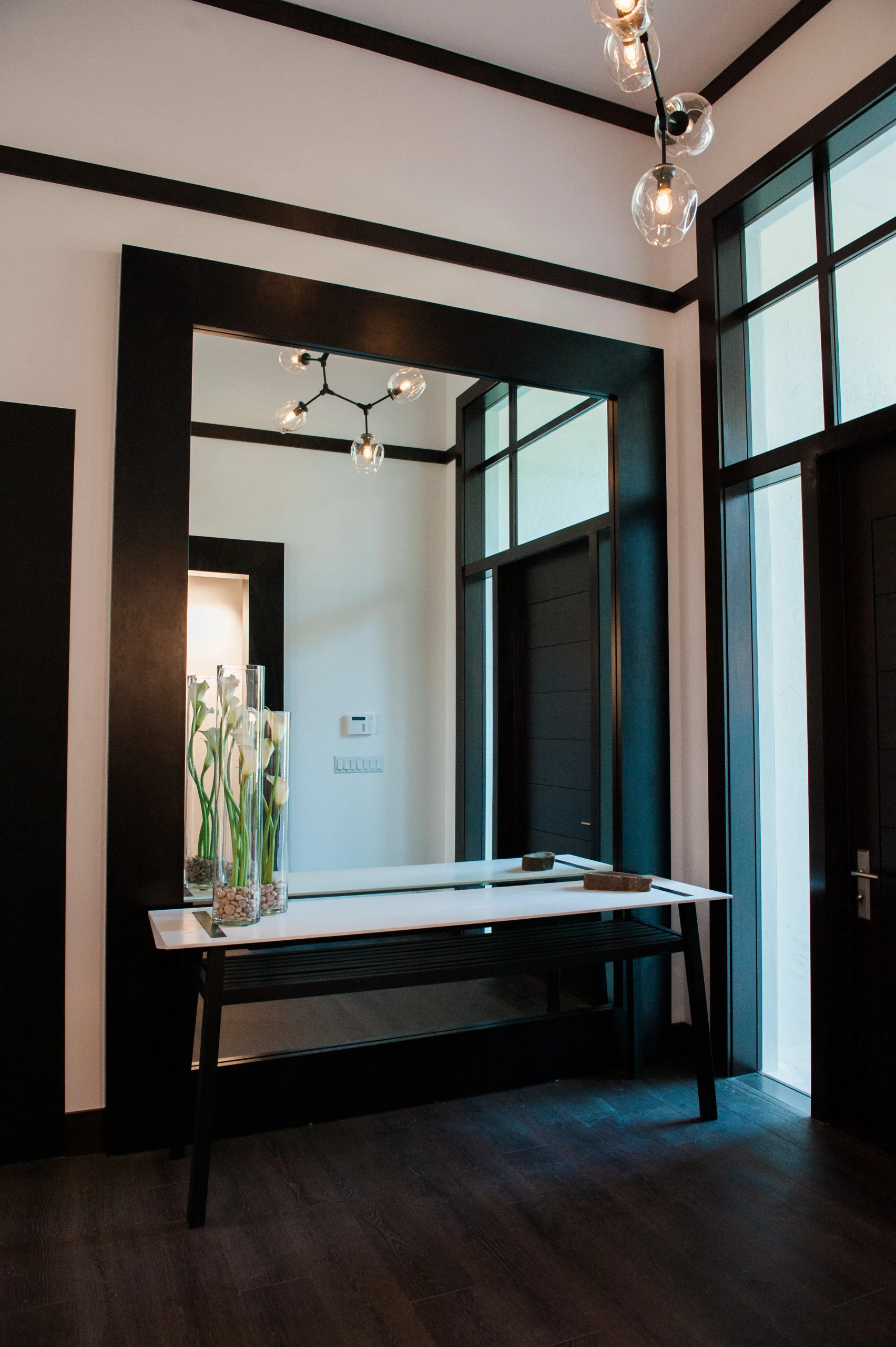 Entryway in the Jupiter residence, designed by Luxe Design Studios